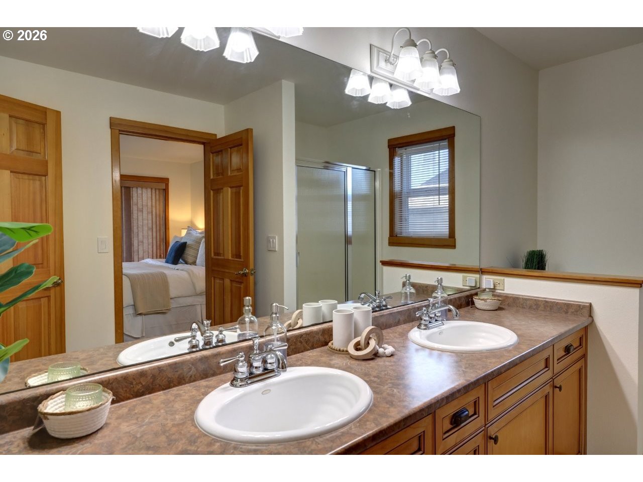 163 West 1st Street Cannon Beach, OR 97110 - Photo 34 of 42 a bathroom with a sink double vanity and a mirror
