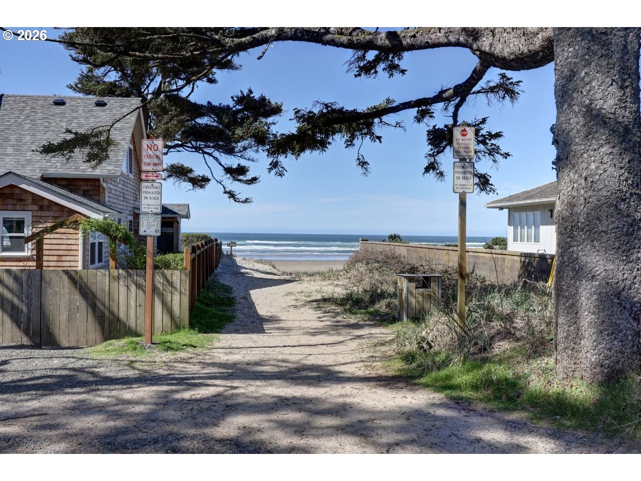 163 West 1st Street Cannon Beach, OR 97110 - Photo 37 of 42 a view of a house with a patio