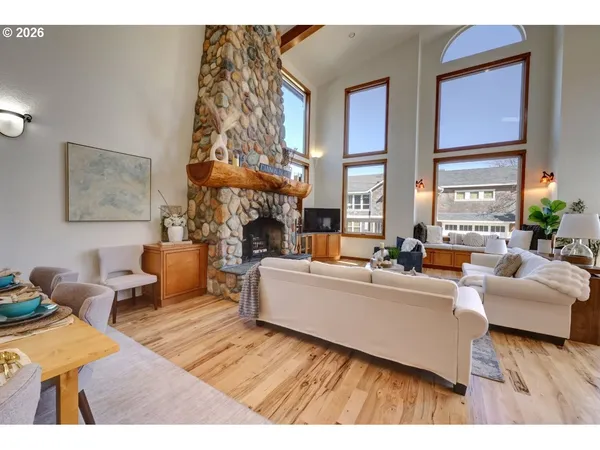 a living room with furniture and a table