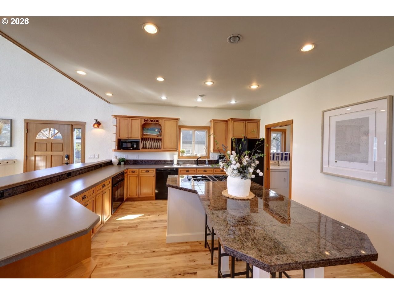 163 West 1st Street Cannon Beach, OR 97110 - Photo 10 of 42 a kitchen with sink and view of living room