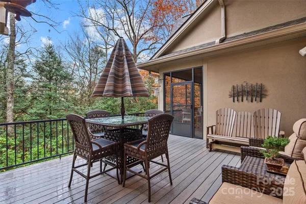 a view of balcony with furniture