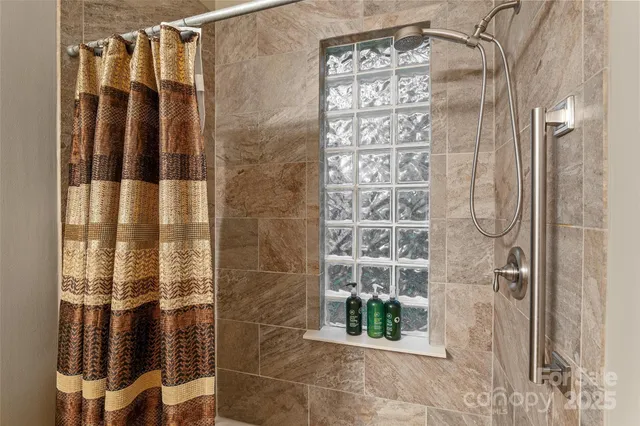 a room with furniture and a large window