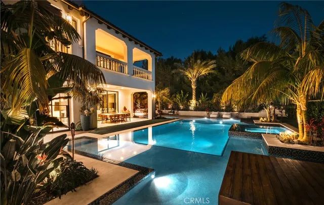 a view of swimming pool with outdoor seating