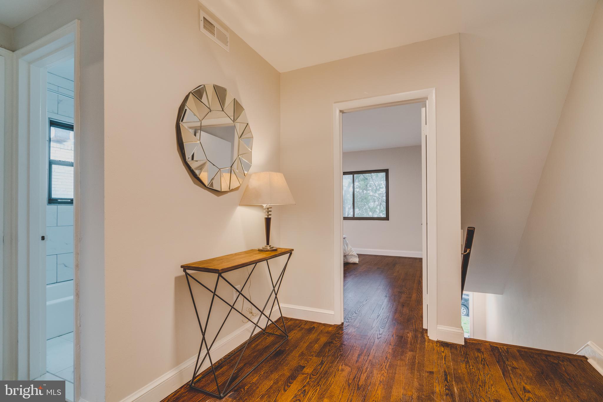 422 Burbank Street Southeast Washington, DC 20019 - Photo 19 of 29 Upstairs landing and entrance to master bedroom