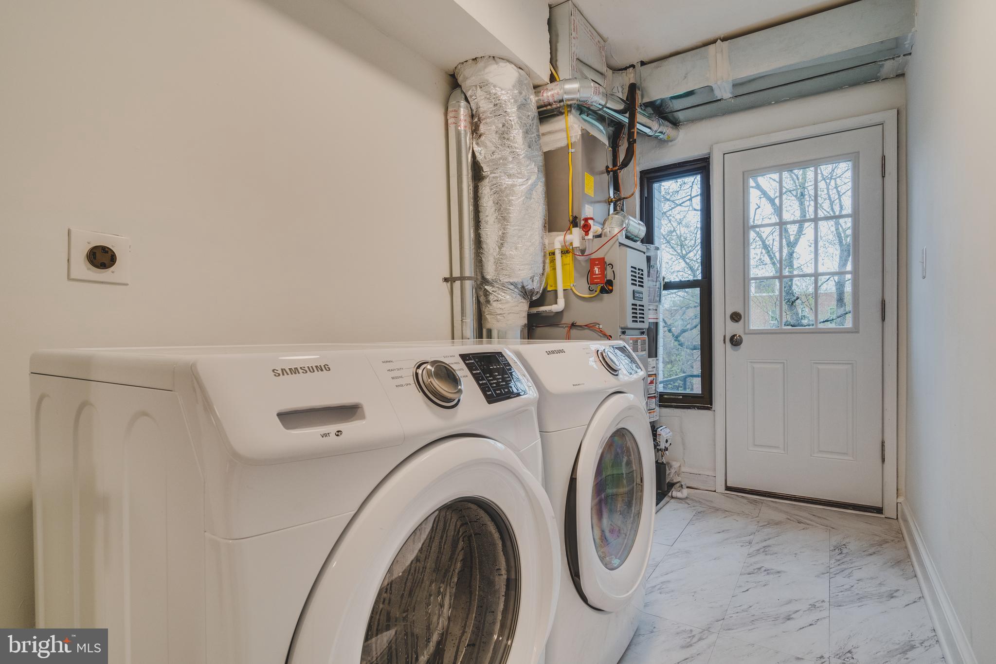 422 Burbank Street Southeast Washington, DC 20019 - Photo 26 of 29 Utility room w/ brand new Samsung washer and dryer
