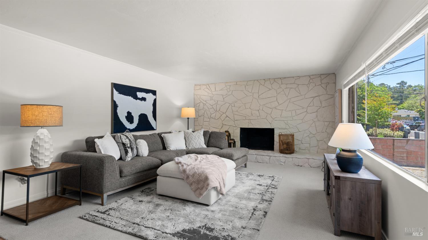 38 Bret Avenue San Rafael, CA 94901 - Photo 6 of 52 a living room with furniture and a fireplace