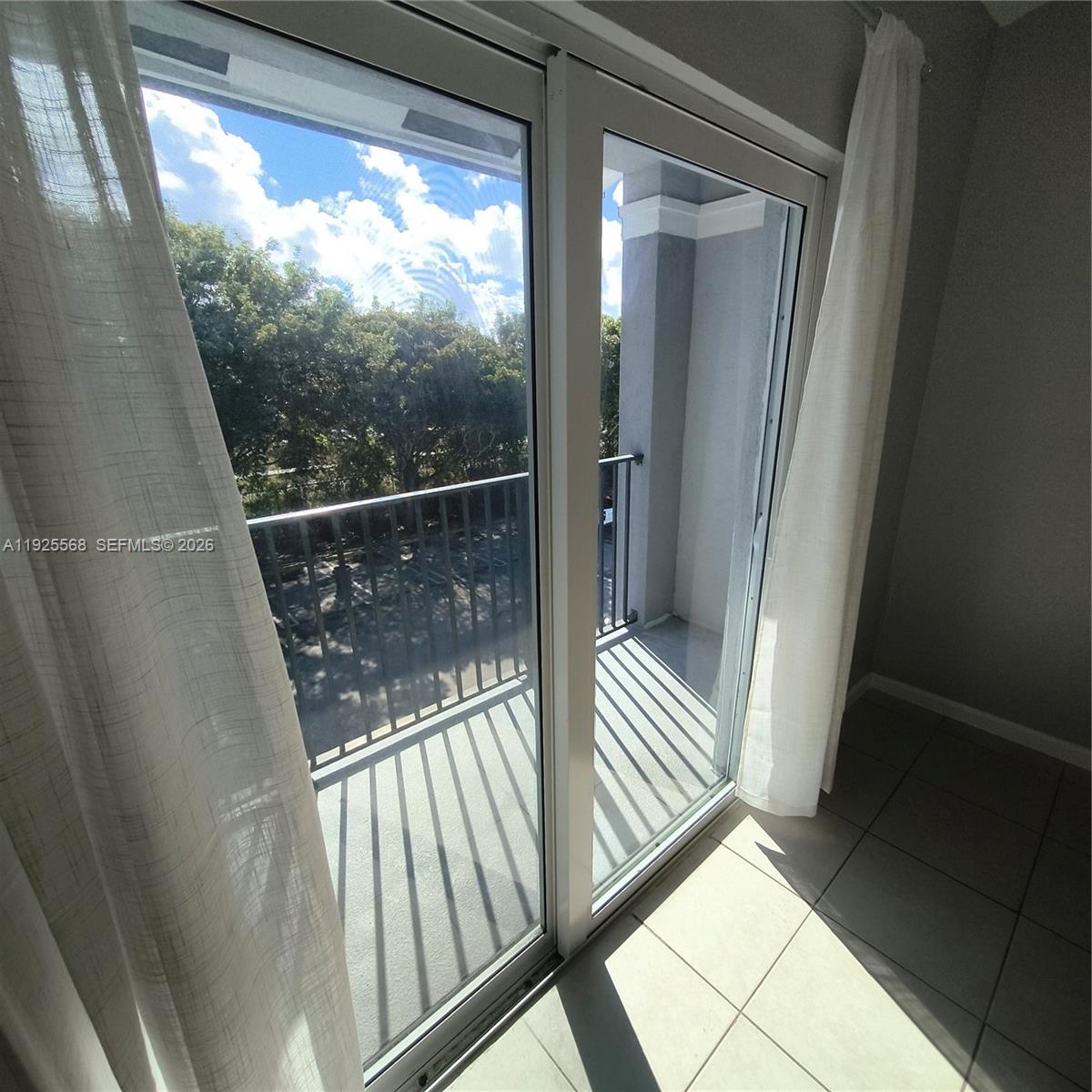 15440 Southwest 284th Street, Unit 5303 Homestead, FL 33033 - Photo 15 of 18 a view of balcony and floor