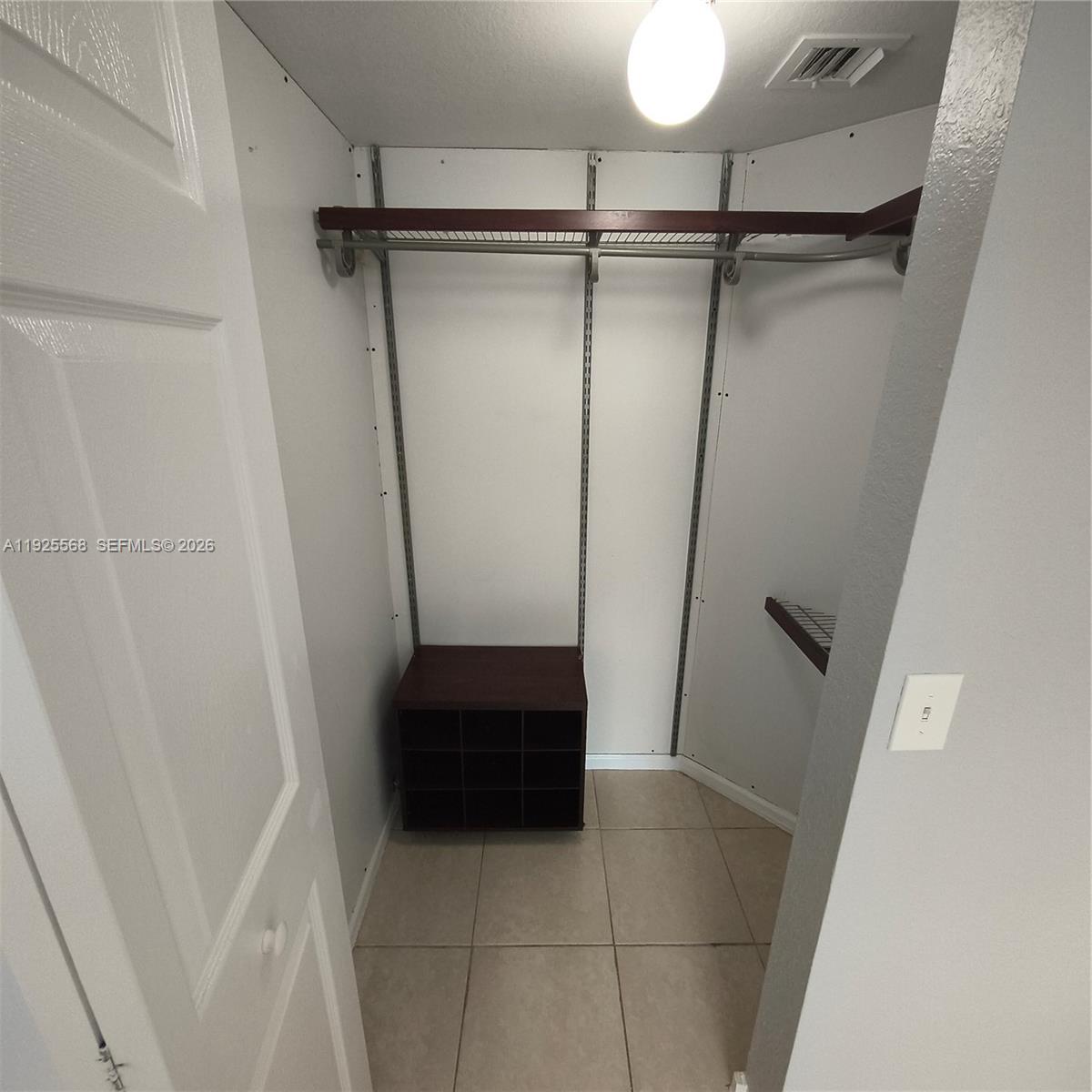 15440 Southwest 284th Street, Unit 5303 Homestead, FL 33033 - Photo 7 of 18 a view of walk in closet