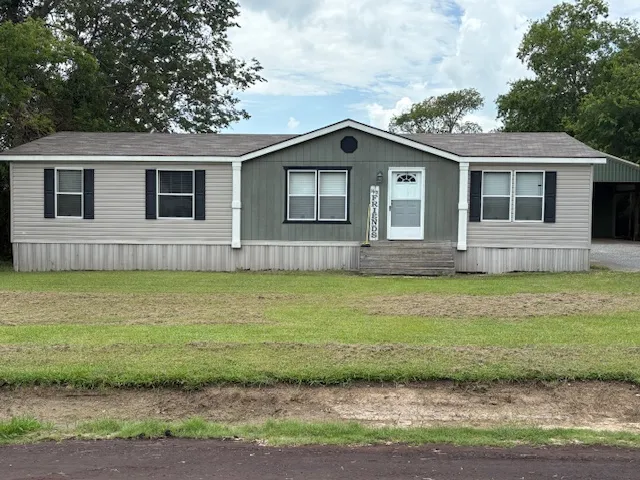 a view of a house with a swimming pool