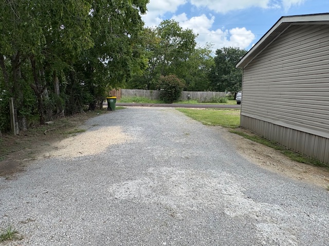 116 Taft Street Normangee, TX 77871 - Photo 11 of 33 a view of a backyard with large trees