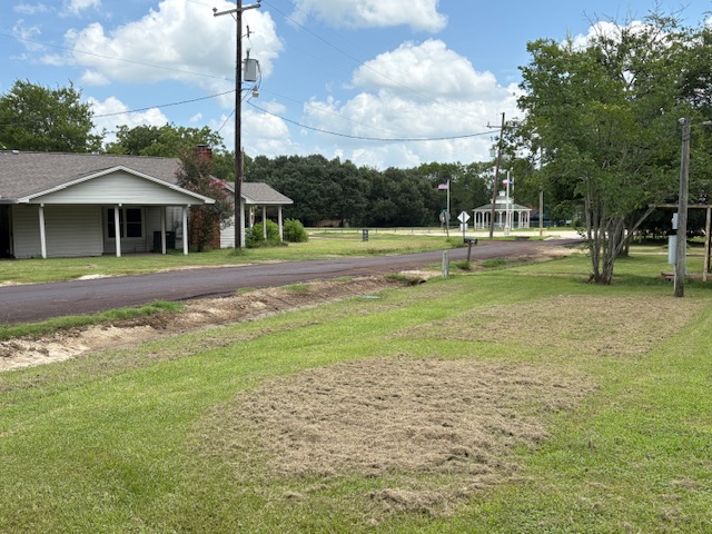 116 Taft Street Normangee, TX 77871 - Photo 12 of 33 a view of a house with a big yard