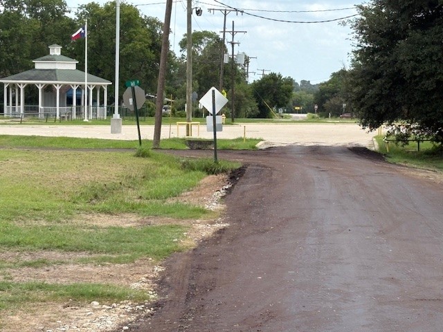 116 Taft Street Normangee, TX 77871 - Photo 15 of 33 a front view of a house with a yard and trees