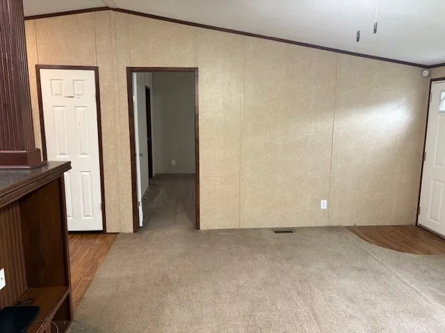 a view of a kitchen with a sink cabinets and a window