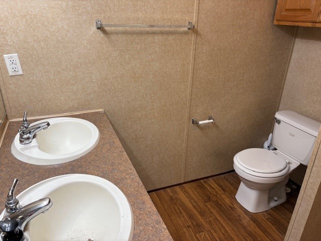 116 Taft Street Normangee, TX 77871 - Photo 28 of 33 a bathroom with a sink and a mirror