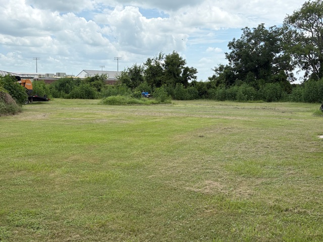 116 Taft Street Normangee, TX 77871 - Photo 10 of 33 a view of a field with an trees in the background