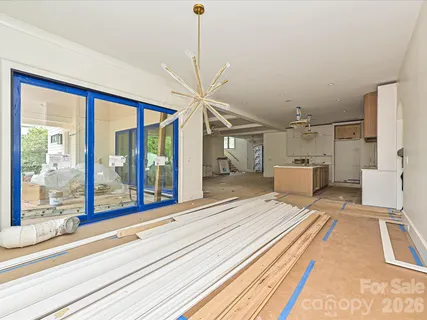 a view of a living room and front door