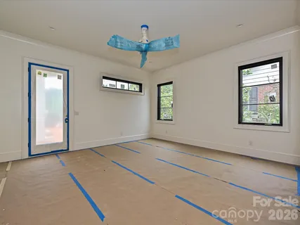 a view of an empty room and window