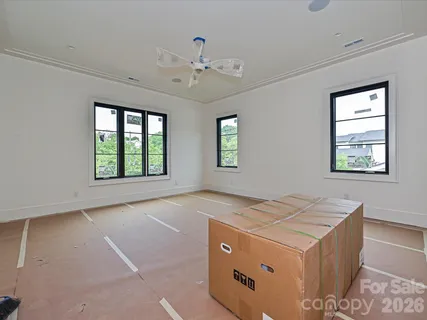 a view of an empty room and window