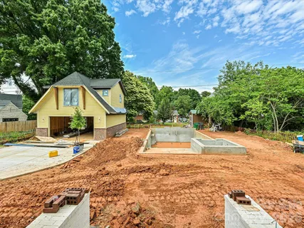 a backyard of a house with seating space