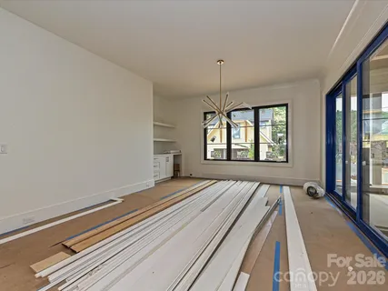 a view of an empty room and window