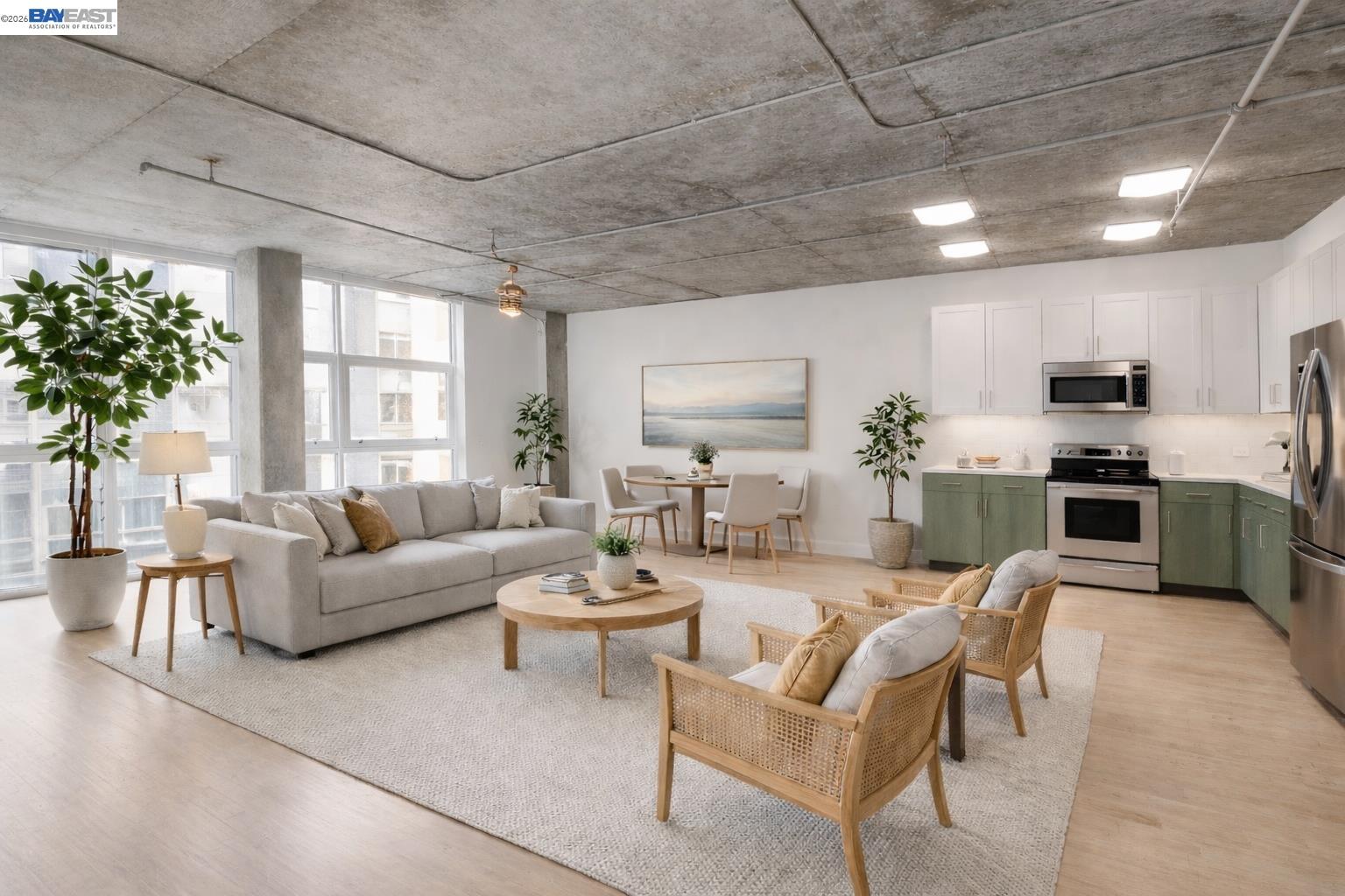 311 Oak Street, Unit 720 Oakland, CA 94607 - Photo 1 of 42 Digitally staged and kitchen cabinets digitally painted.