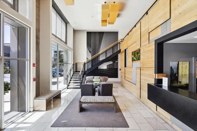 a swimming pool with outdoor seating and yard