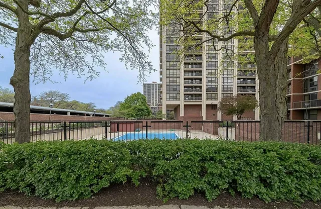a view of a building with a garden