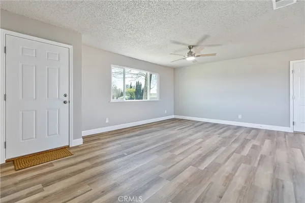 a view of a hallway with washer and dryer