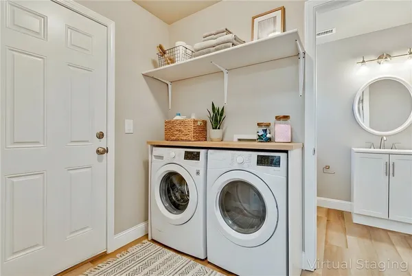 a bathroom with a toilet a sink and a mirror