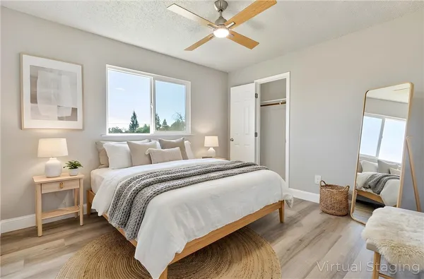 green view of a tennis ground with a table and chairs
