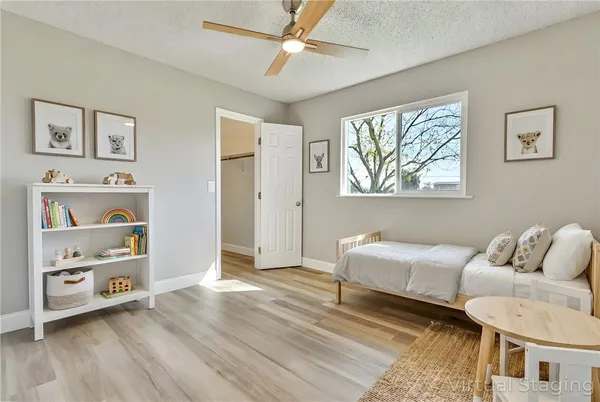 a view of swimming pool with sitting area