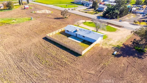 a view of a swimming pool and an outdoor space