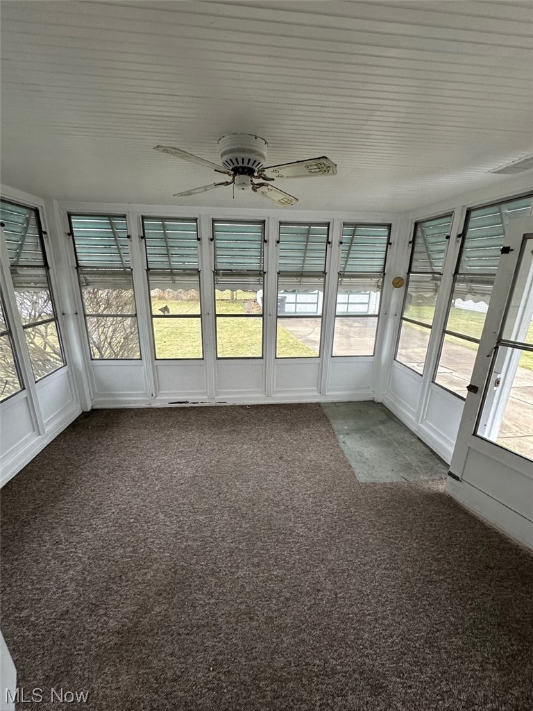 4994 North Barton Road Cleveland, OH 44124 - Photo 9 of 28 Unfurnished sunroom featuring ceiling fan