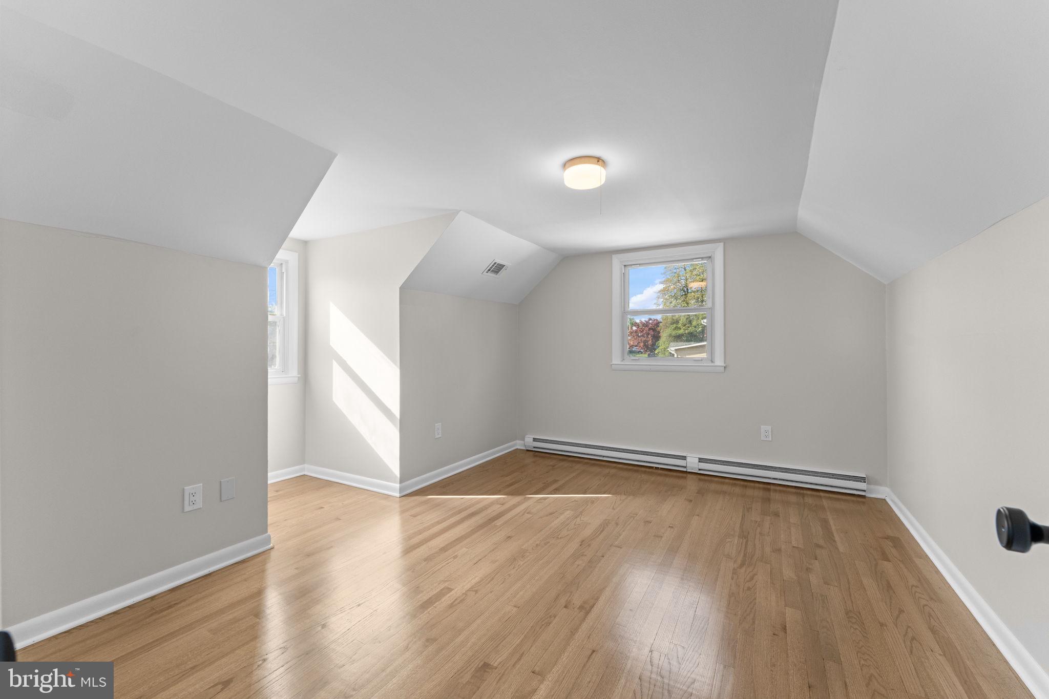 222 Chelsea Road Pasadena, MD 21122 - Photo 39 of 90 Upper Bedroom #2, bright, refinished wood floors