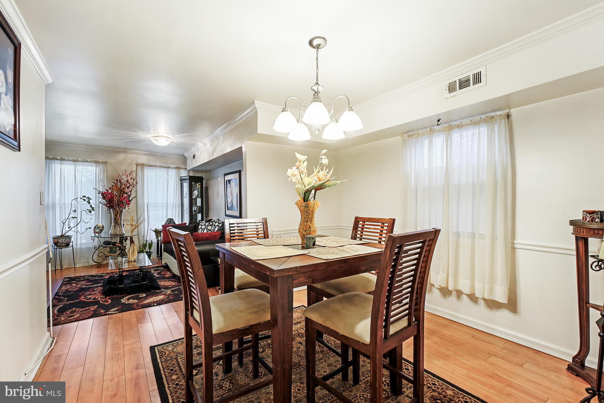 1018 45th Street Northeast Washington, DC 20019 - Photo 10 of 30 a view of a dining room with furniture and wooden floor