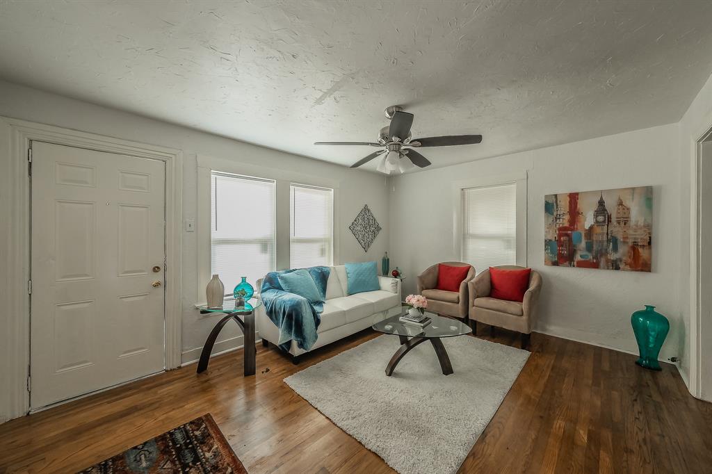5643 Cary Street Dallas, TX 75227 - Photo 2 of 23 a living room with furniture and a window