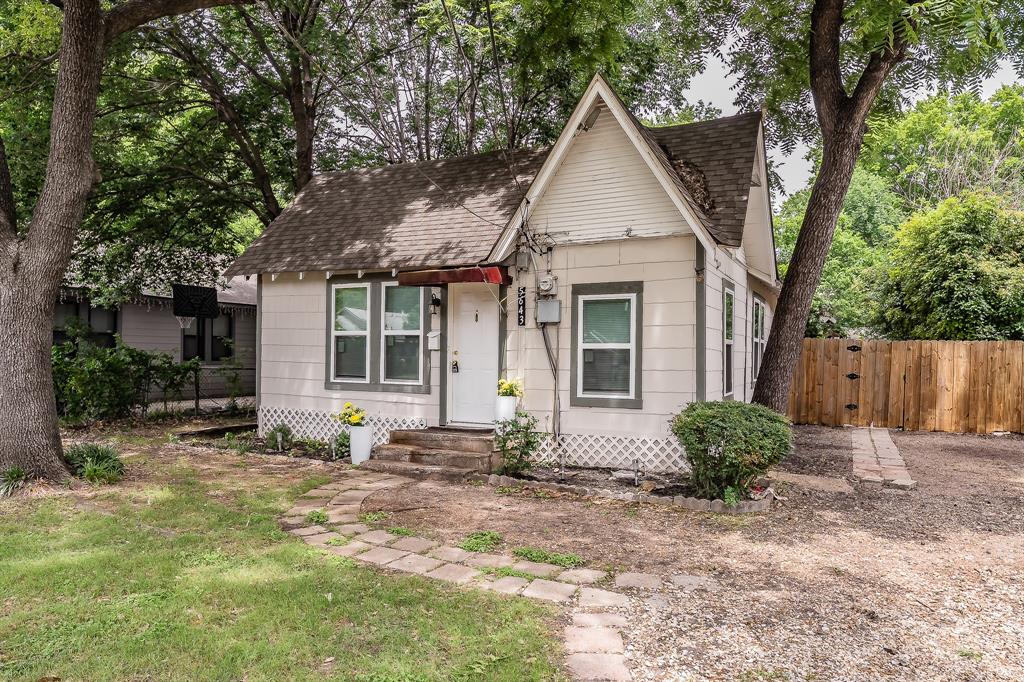 5643 Cary Street Dallas, TX 75227 - Photo 22 of 23 a view of a house with backyard