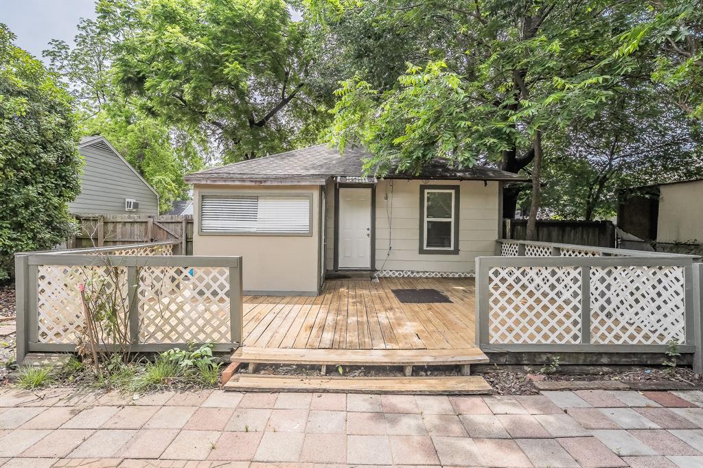5643 Cary Street Dallas, TX 75227 - Photo 23 of 23 a front view of a house with a tree