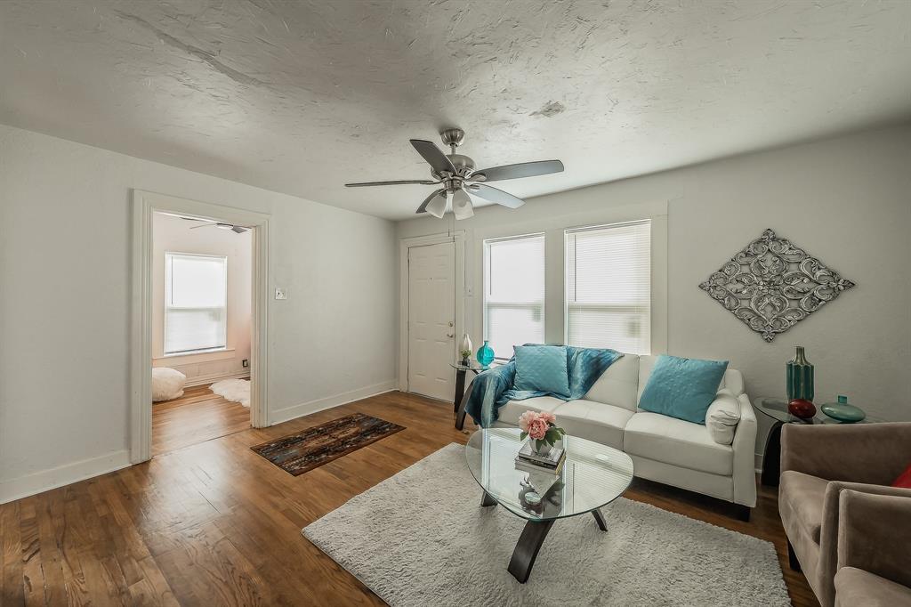 5643 Cary Street Dallas, TX 75227 - Photo 5 of 23 a living room with furniture and a window