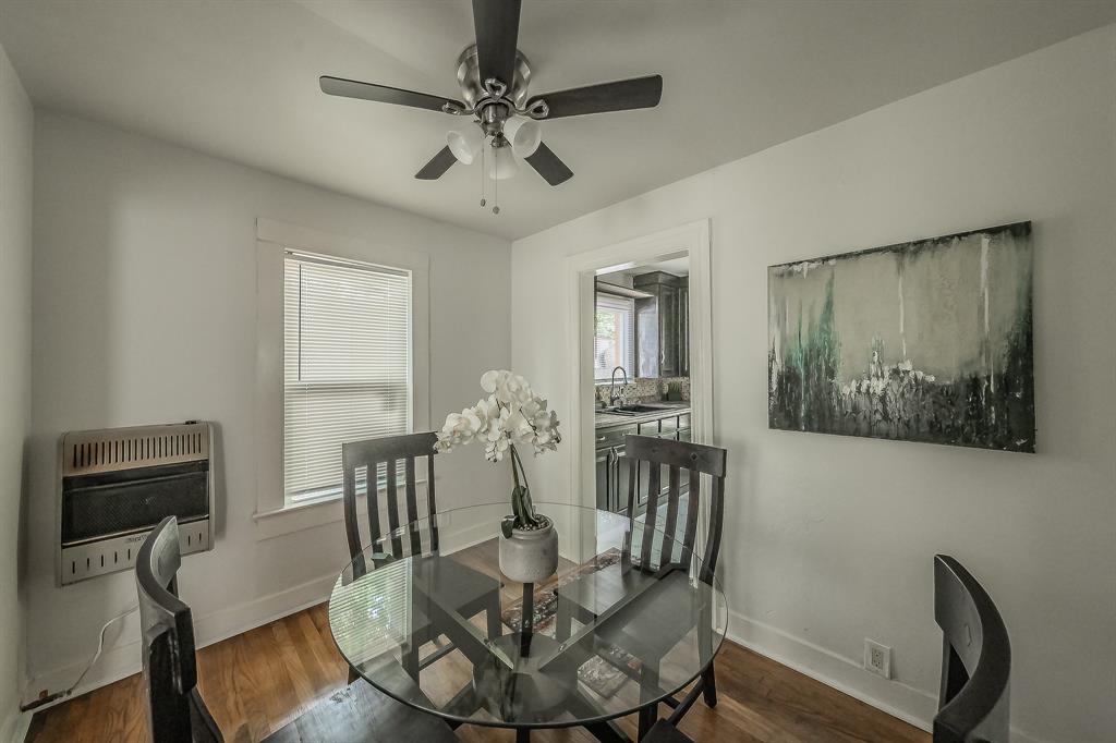 5643 Cary Street Dallas, TX 75227 - Photo 8 of 23 a view of a dining room with furniture and wooden floor