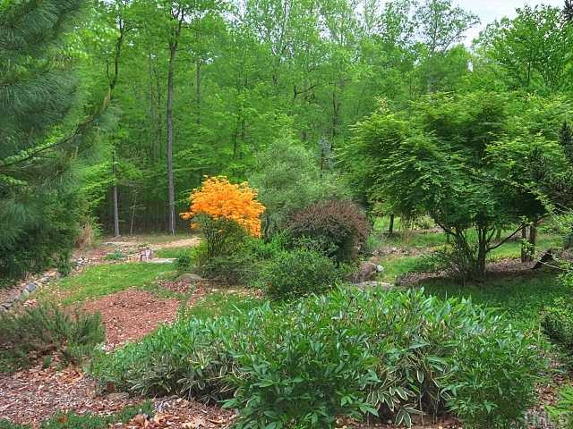 7422 Johnson Mill Road Bahama, NC 27503 - Photo 21 of 25 Lush Landscaping Just Draws You In, Makes You Feel at Home! Other