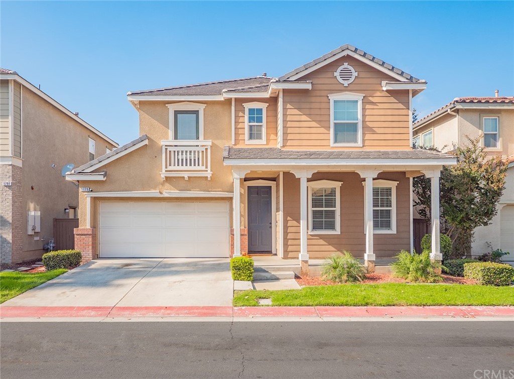 1779 Edmon Way Riverside, CA 92501 - Photo 1 of 63 front view of a house with a yard