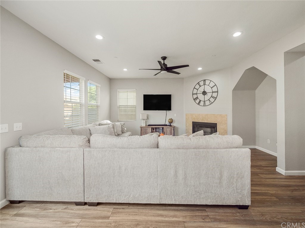 1779 Edmon Way Riverside, CA 92501 - Photo 19 of 63 a living room with furniture and a flat screen tv