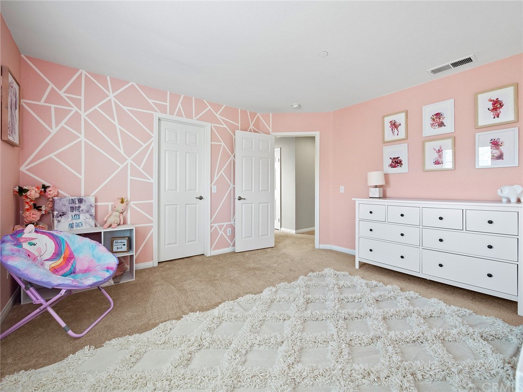 1779 Edmon Way Riverside, CA 92501 - Photo 30 of 63 a view of livingroom with toys