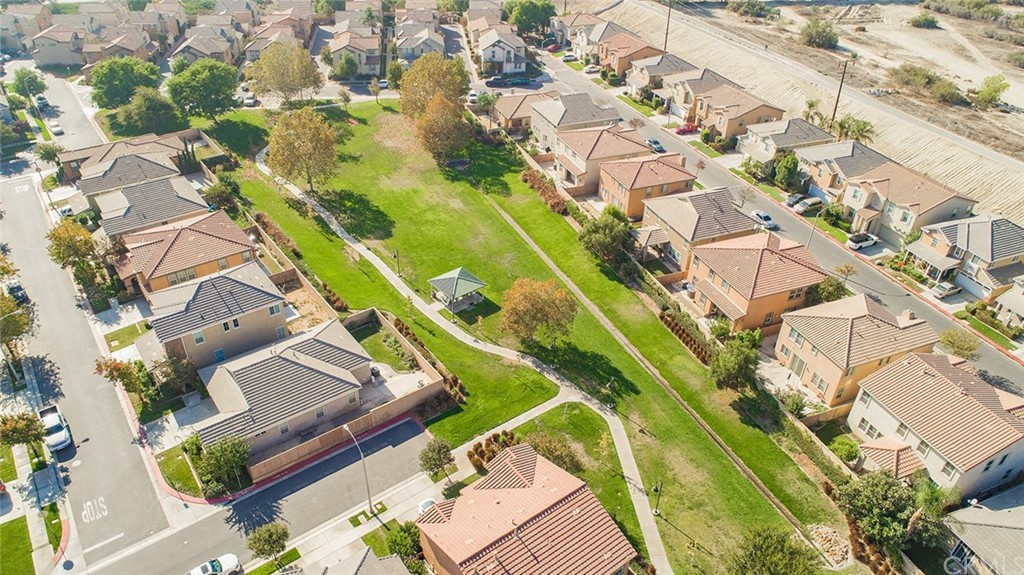 1779 Edmon Way Riverside, CA 92501 - Photo 60 of 63 an aerial view of a residential houses with yard