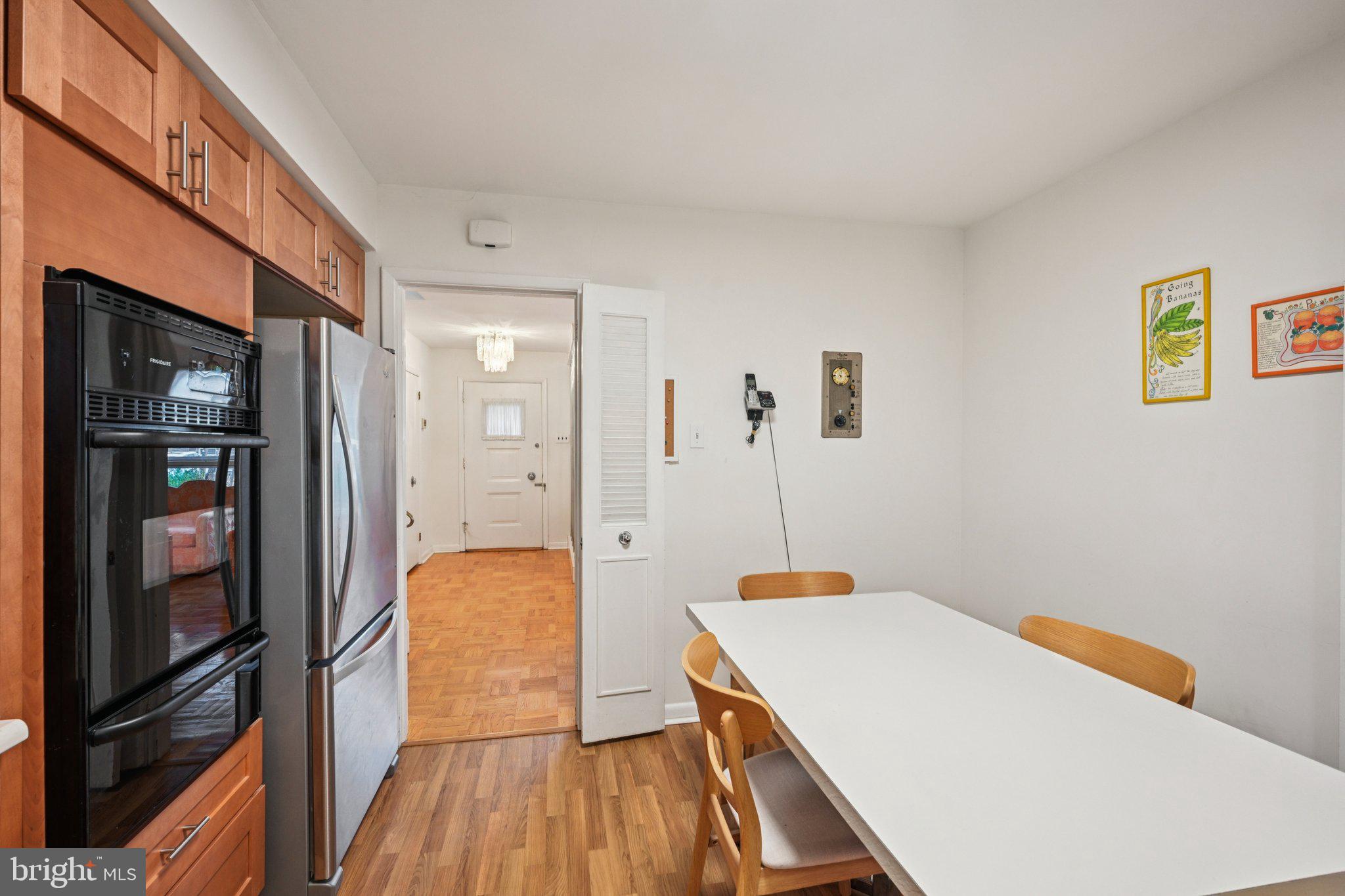 9227 Burbank Road Philadelphia, PA 19115 - Photo 17 of 46 a bedroom with a bed and wooden floor