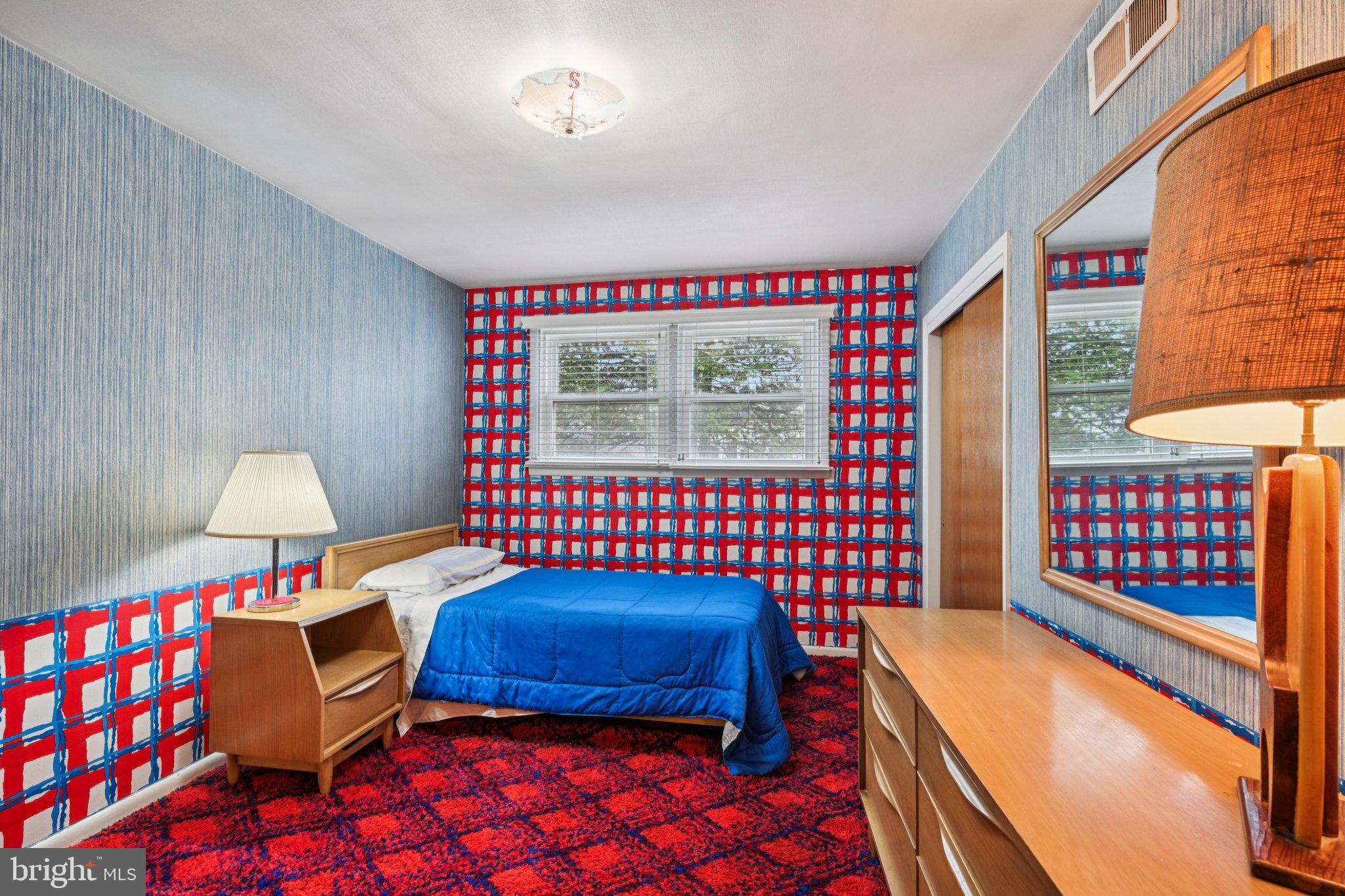 9227 Burbank Road Philadelphia, PA 19115 - Photo 22 of 46 a bedroom with furniture and a window