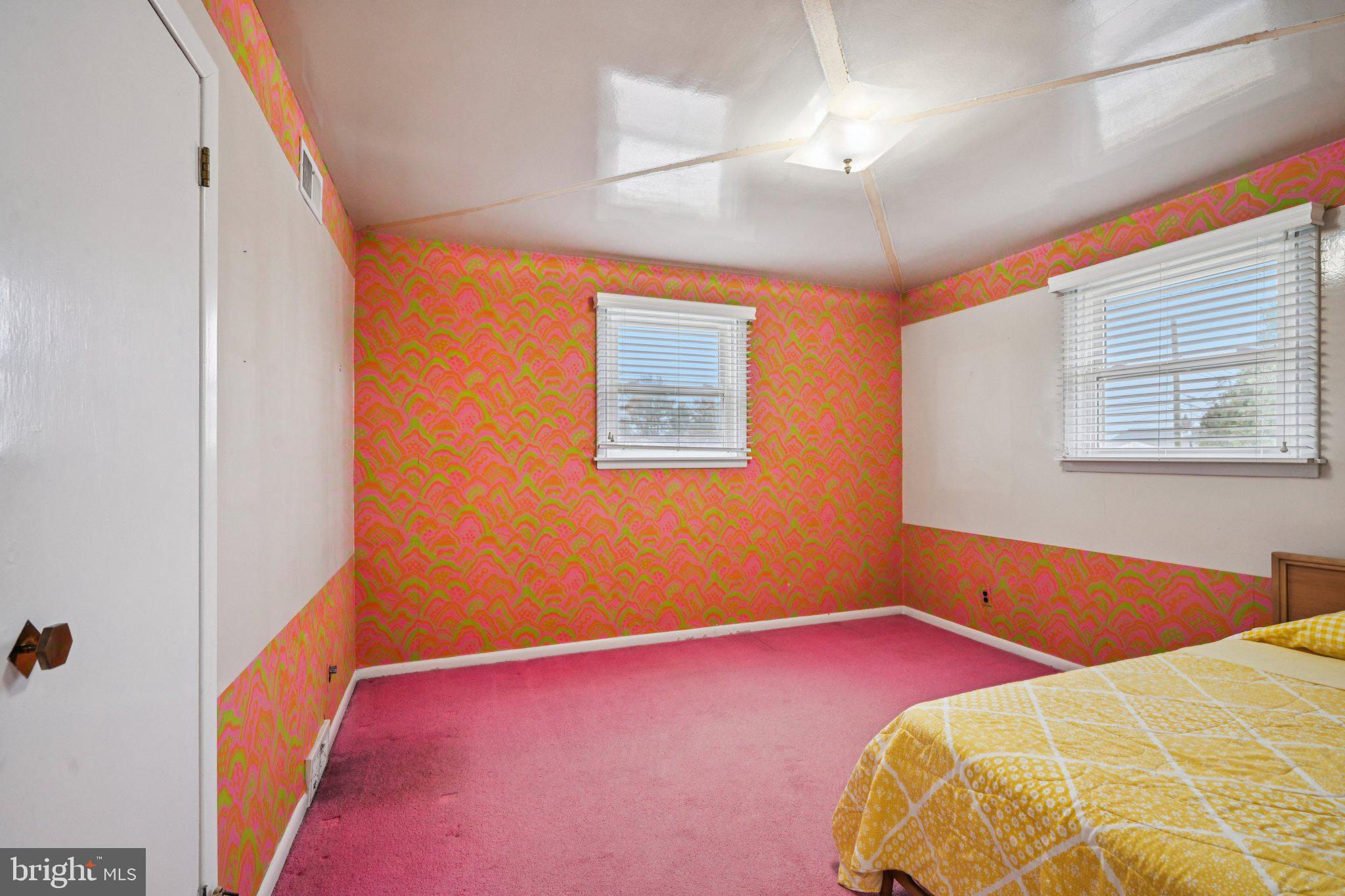 9227 Burbank Road Philadelphia, PA 19115 - Photo 23 of 46 a bedroom with a bed and a chandelier fan