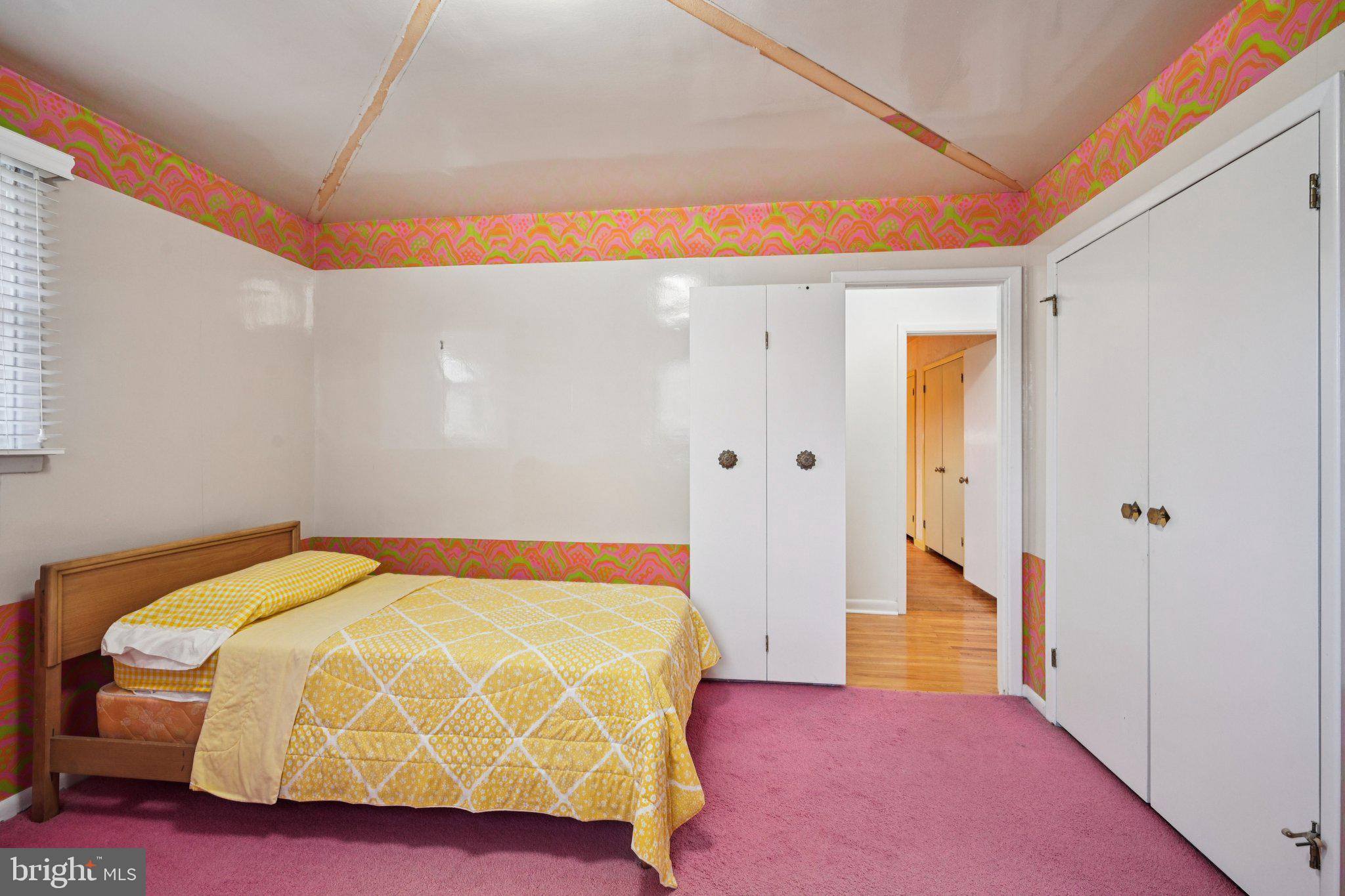 9227 Burbank Road Philadelphia, PA 19115 - Photo 24 of 46 a bedroom with a bed and a table