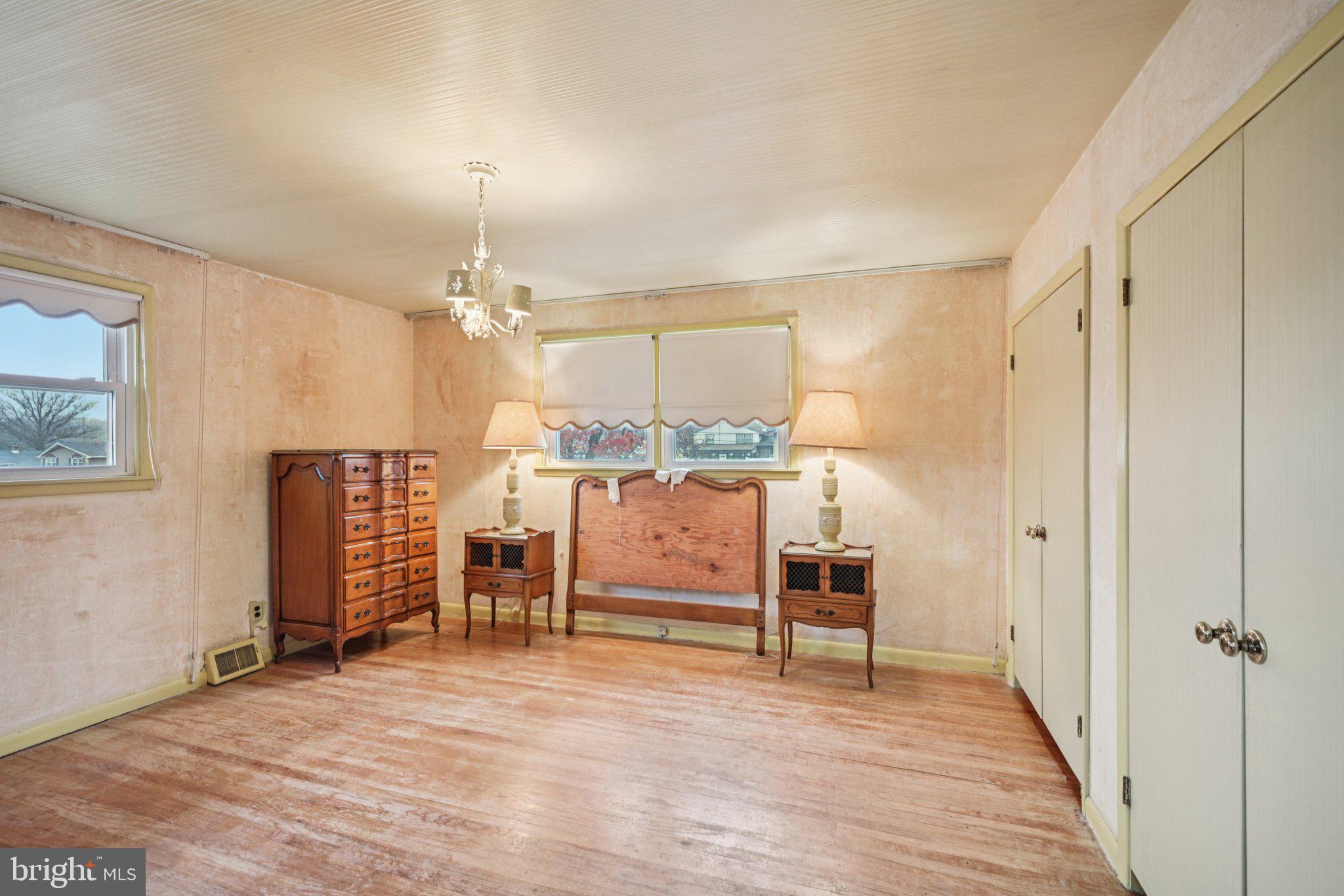 9227 Burbank Road Philadelphia, PA 19115 - Photo 25 of 46 a bedroom with furniture and window